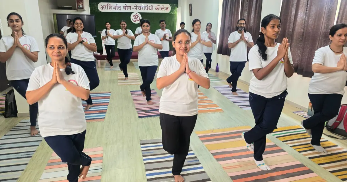Group meditation session in yoga certification program