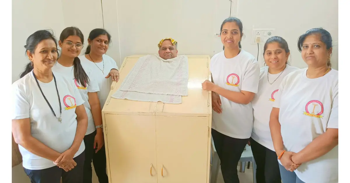 Students learning breathing exercises in yoga certification class